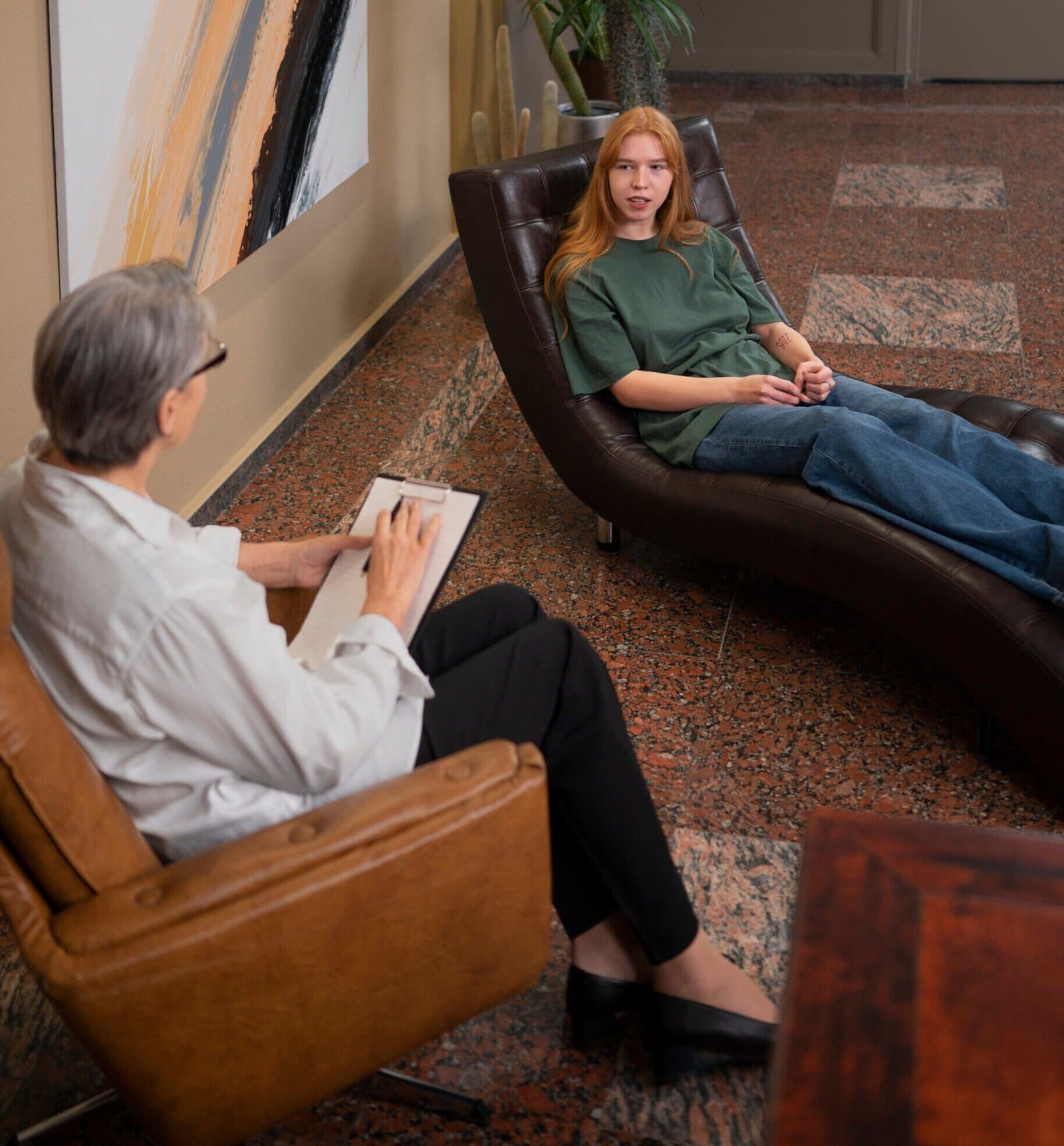 Young person in a supportive therapy session