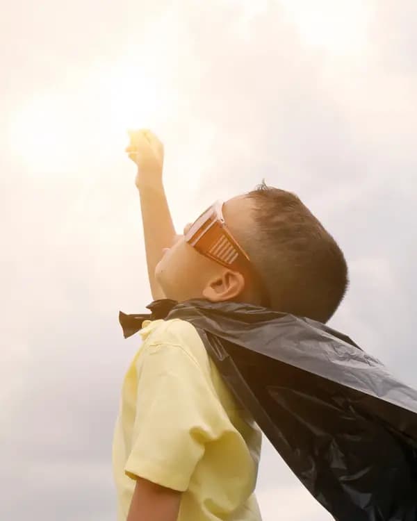 Child reaching up, joyful play