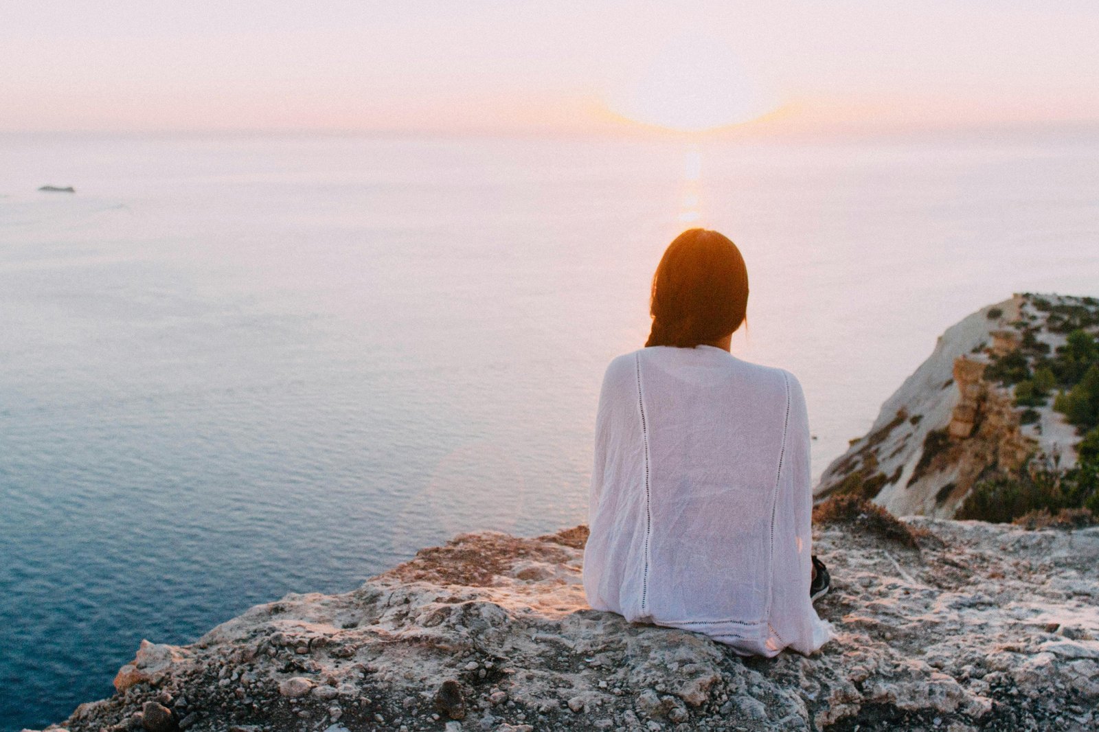 Woman looking out at ocean